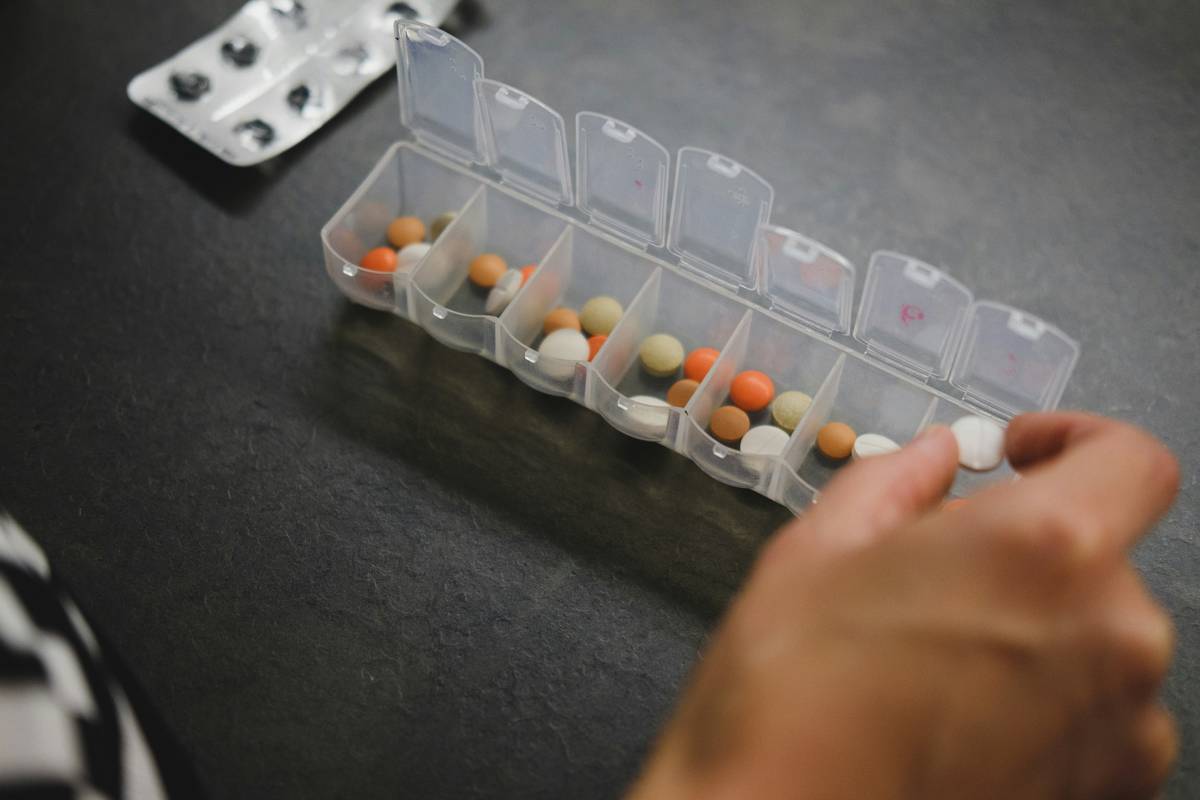 Prenatal vitamin safe dose comparison chart showing recommended daily allowances by trimester
